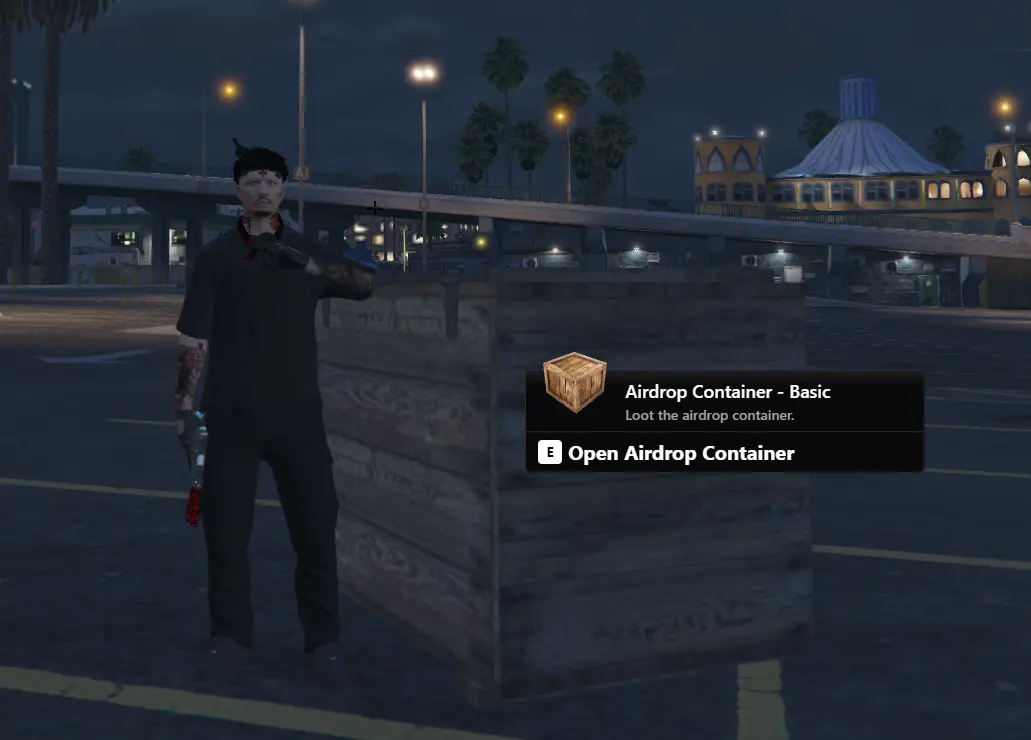 LibertyRush citizen beside an airdrop container during a nighttime event